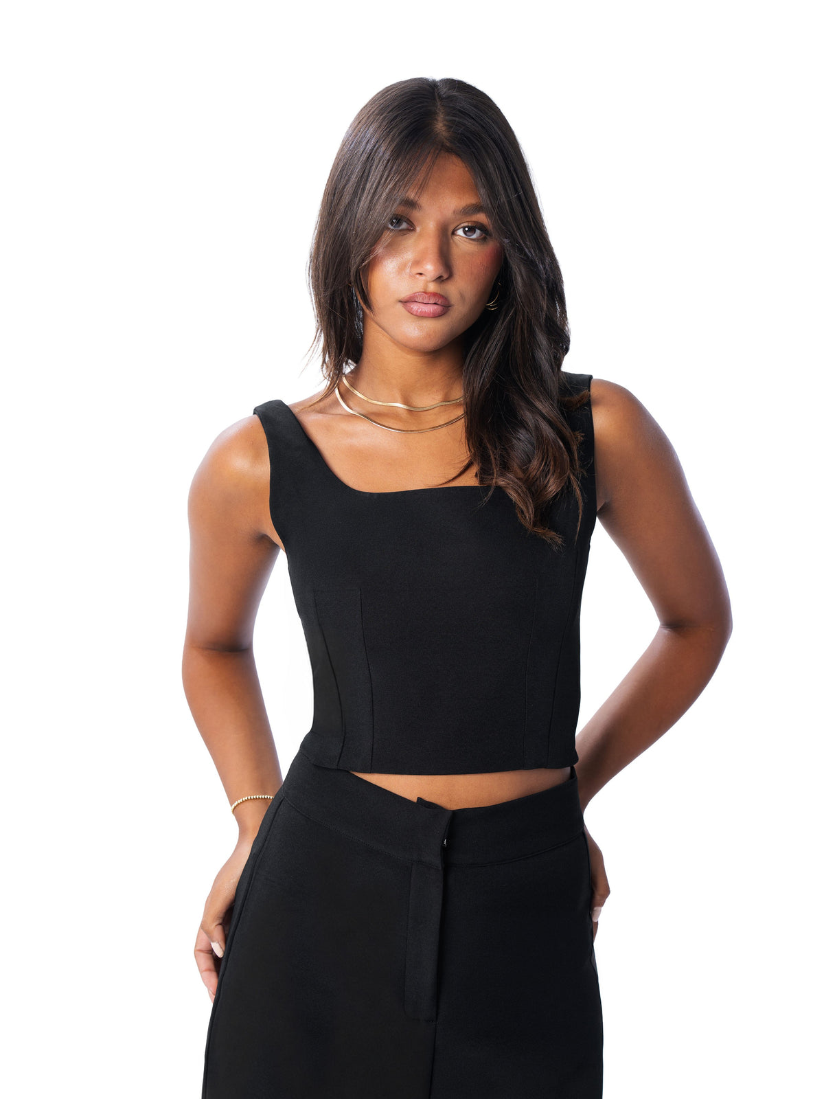 Black square-neck corset worn without the cape