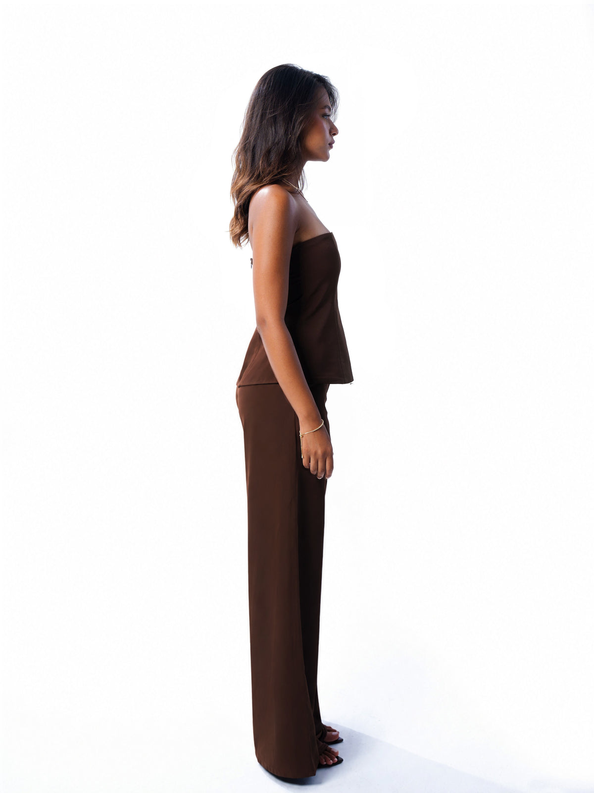 Brown bustier and trouser set, side profile