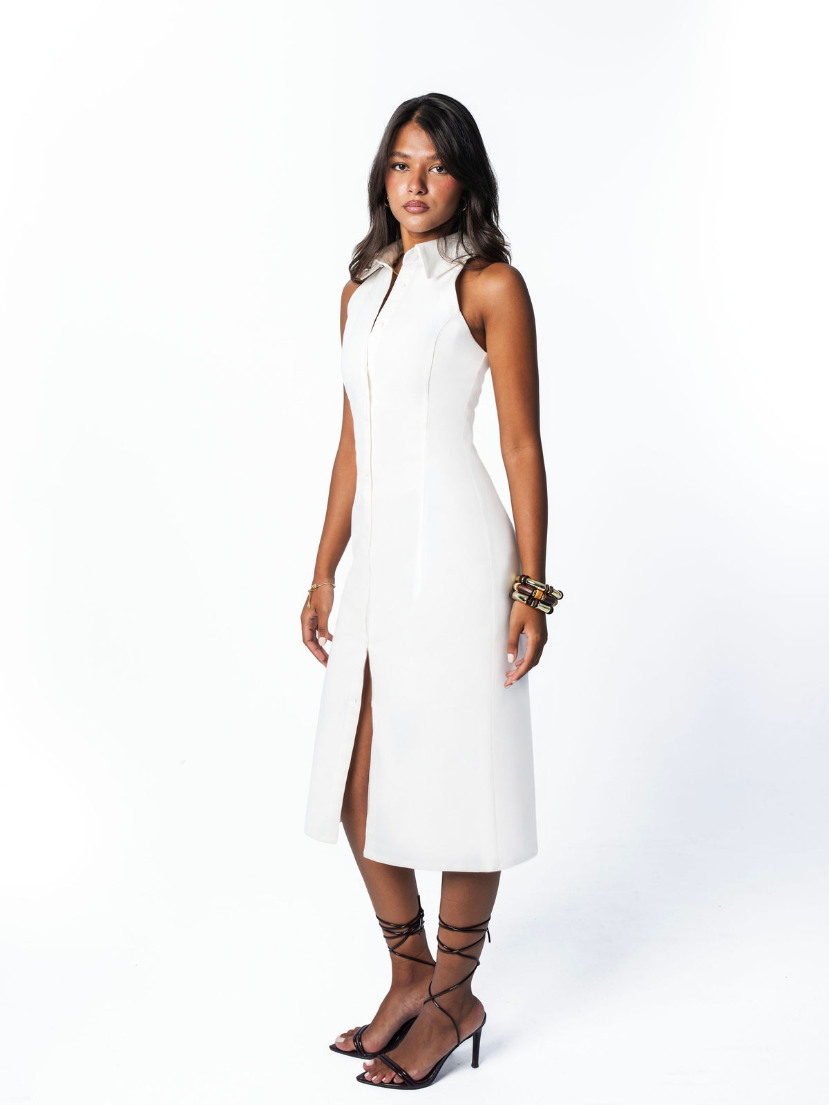 White midi shirt dress, three-quarter view with front slit